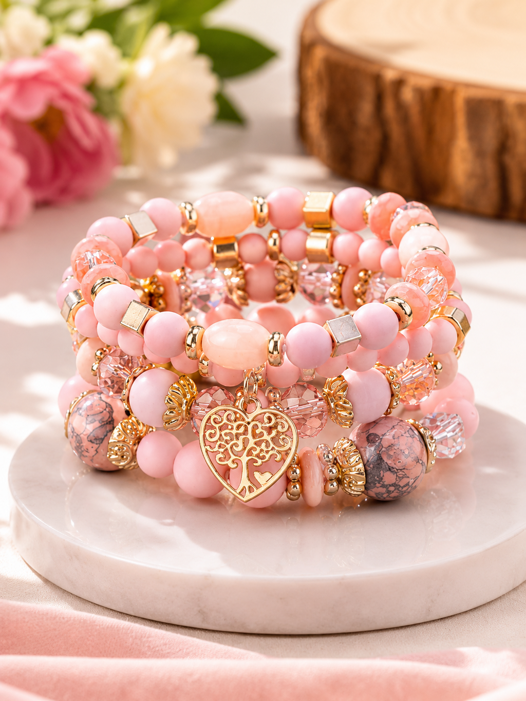 Pink stacked beaded bracelet set with tree charm