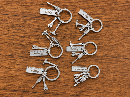 Silver Dad, Papa and Grandpa tool keychains with miniature tool charms